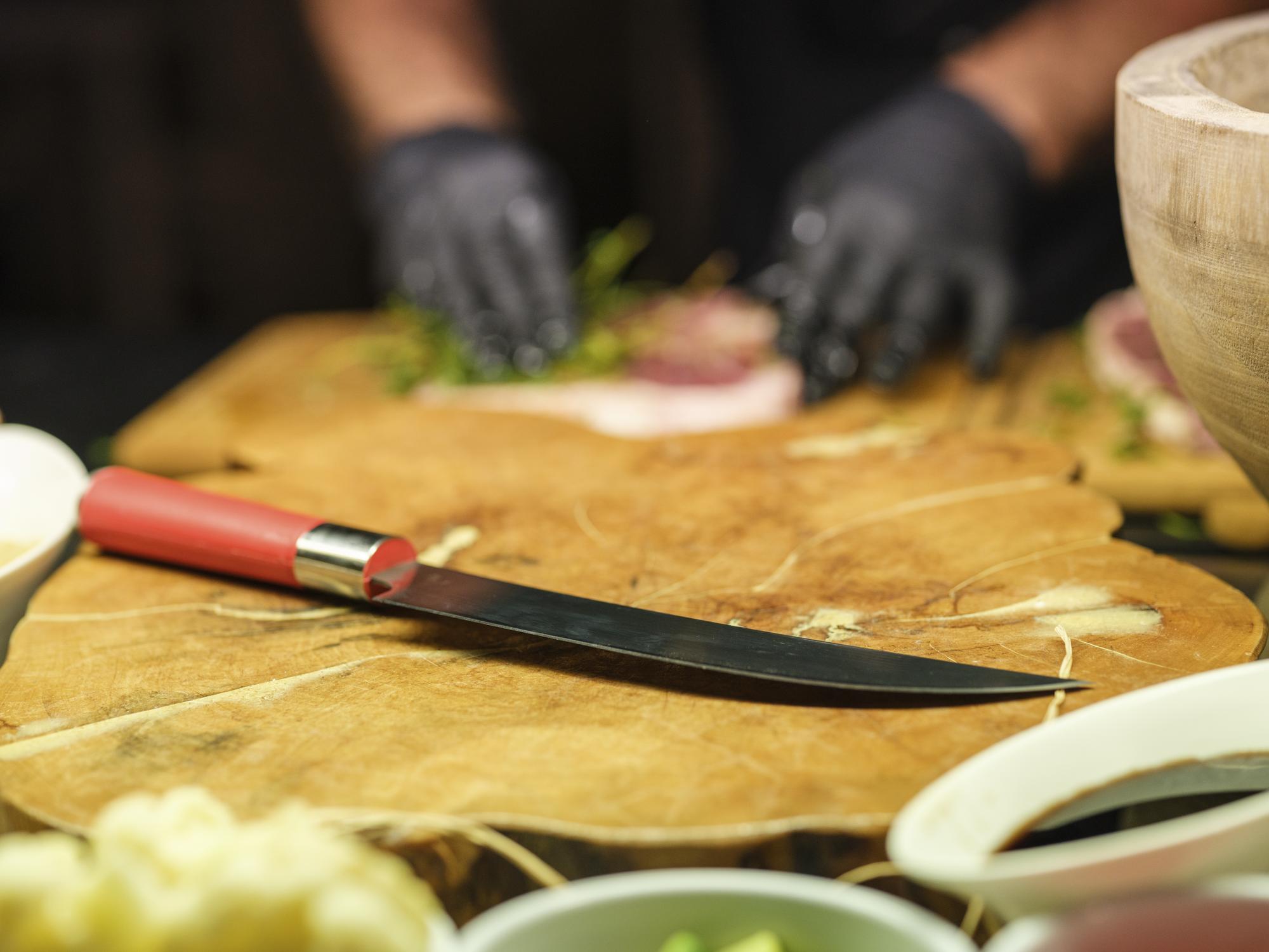 Close-up of knife skills demonstration